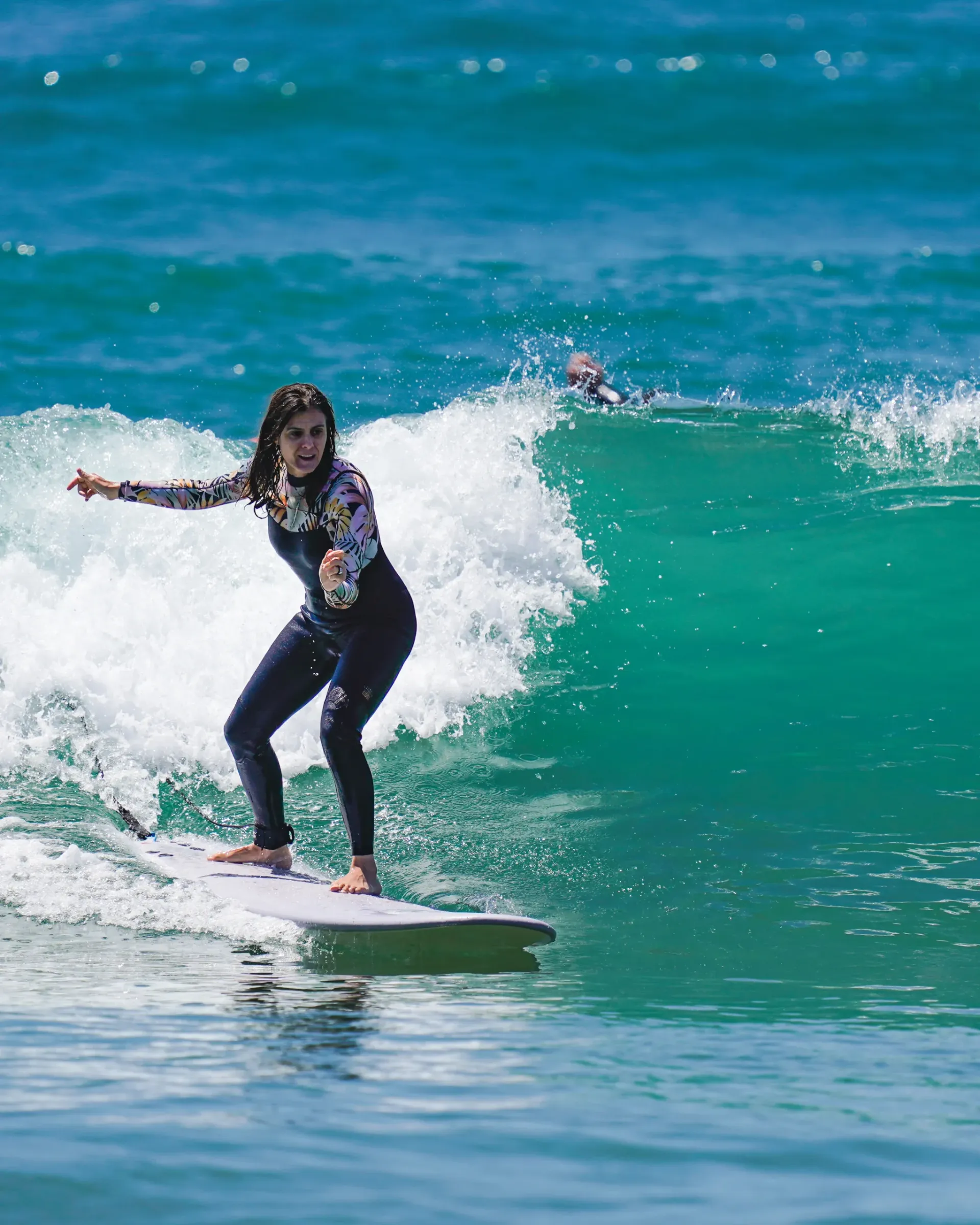 Surfer riding a wave at Imsouane, showcasing skill and excitement.